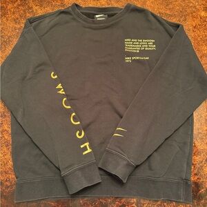 Nike Men's Black Crewneck Sweater with Yellow Accents